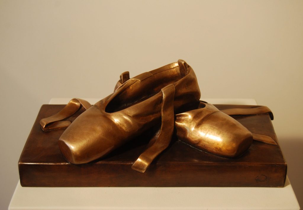 Le scarpette fusione di bronzo
